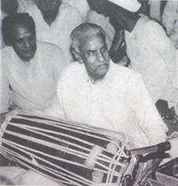 Purushottam Das, Pakhawaji, 1983, Nathdwara, Rajasthan.  Photo courtesy of Anne-Marie Gaston in her 1997 book Krishna's Musicians