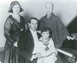 Beate Sirota – 1929 – Tokyo – with father Leo Sirota at the piano, mother Augustine Horenstein Sirota and composer Yamada Kosaku standing. Photograph courtesy of the Gordon Family